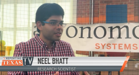 Photo of Neel Bhatt conducting a media interview